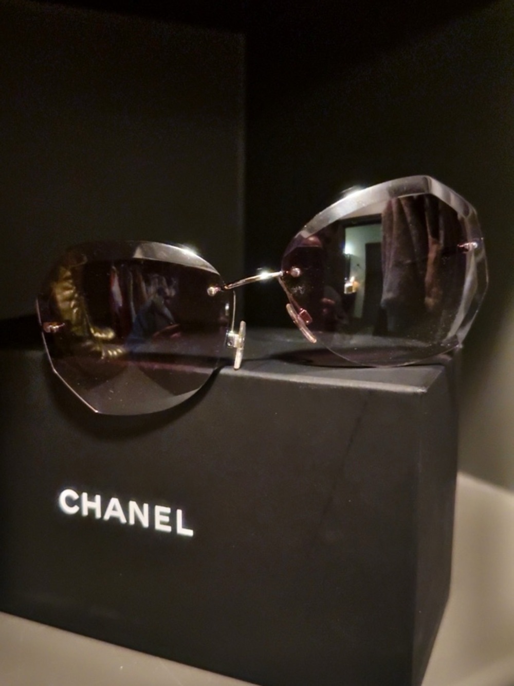 CHANEL Rimless Sunglasses with Gradient Smoke Lenses and Gold Accents